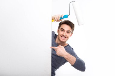 man holding paint roller clipart