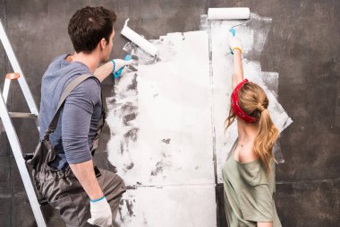 couple painting wall clipart