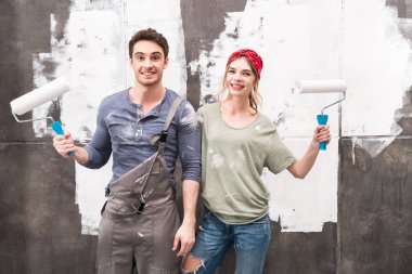 couple with paint rollers clipart