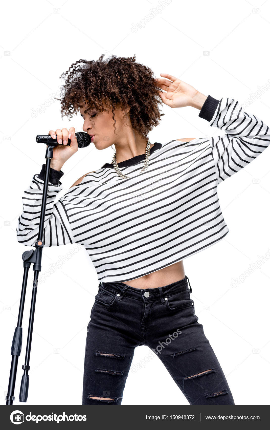 Young singer with microphone — Stock Photo © DmitryPoch #150948372