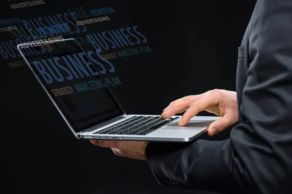 Businessman with laptop computer — Stock Photo, Image