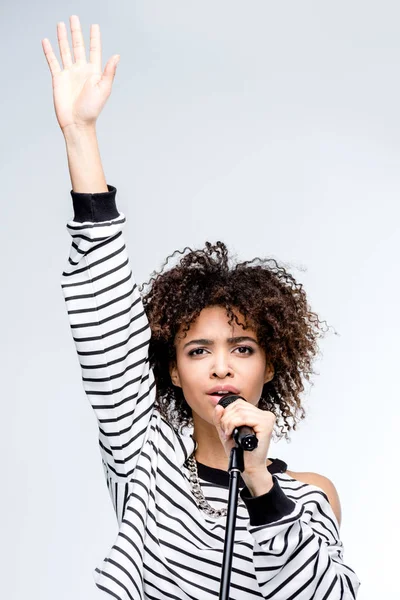 Young singer with microphone — Stock Photo, Image