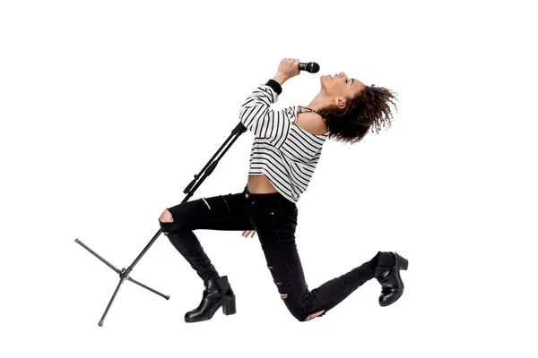 Young singer with microphone — Stock Photo, Image