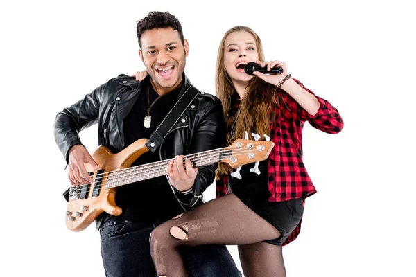 Couple with microphone and guitar — Stock Photo, Image