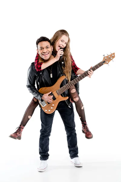 Couple with microphone and guitar — Stock Photo, Image