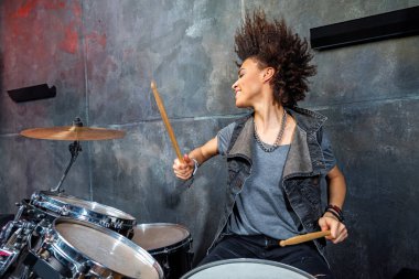 woman playing drums clipart