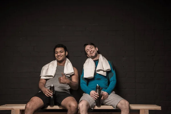 Athletes at locker room — Stock Photo, Image