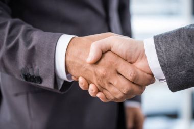 businessmen shaking hands clipart