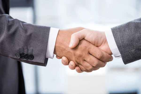 Businessmen shaking hands — Stock Photo, Image