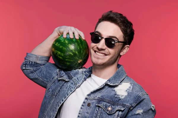 Casual man holding watermelon — Stock Photo, Image