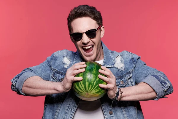 Casual man holding watermelon — Stock Photo, Image