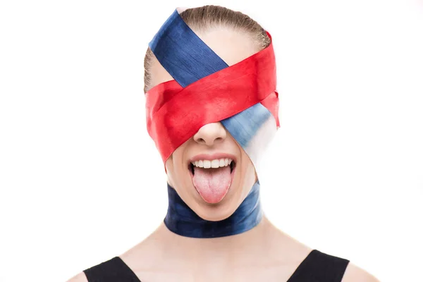 Woman with wrapped face sticking tongue — Stock Photo, Image