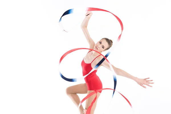 Vrouw ritmisch gymnaste uitvoeren met touw — Stockfoto