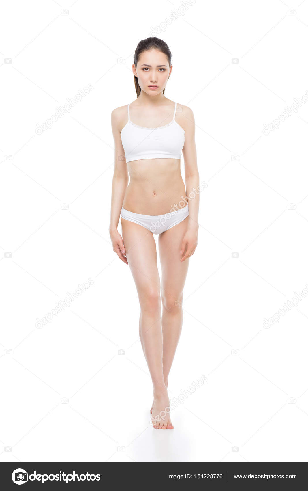 Elegant Asian Girl Posing In White Underwear Isolated On White
