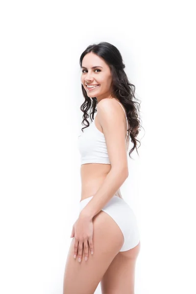 Vrouw poseren in wit ondergoed — Stockfoto