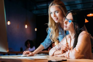 businesswomen working on computer clipart