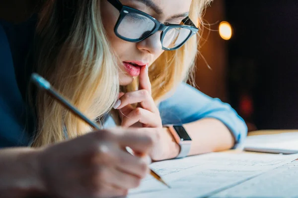 Student studying till late Stock Photo