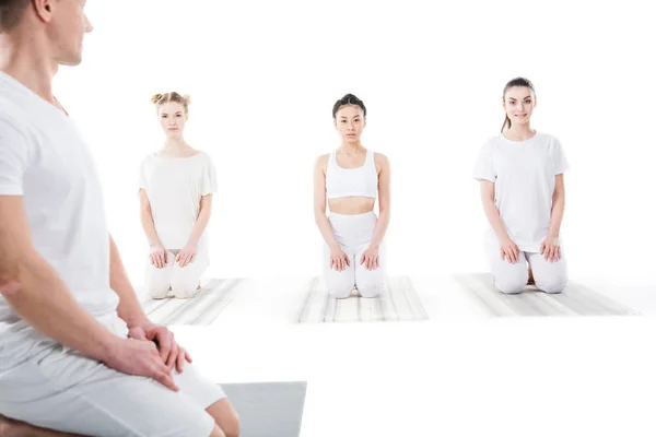 Women practicing yoga with trainer — Stock Photo, Image