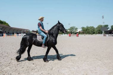 Man riding horse  clipart