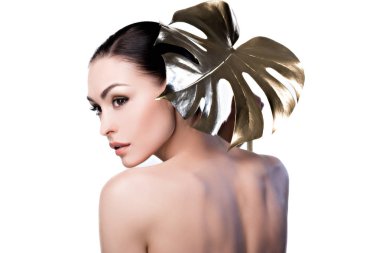woman with big golden leaf clipart