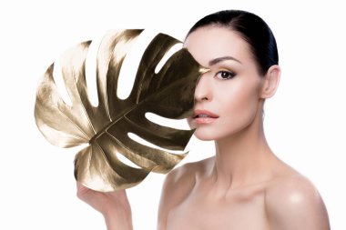 woman with big golden leaf clipart