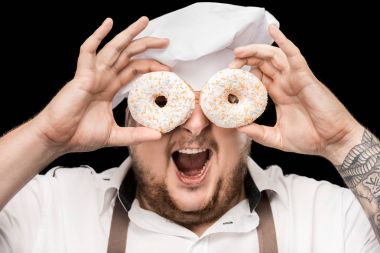Chef holding doughnuts  clipart