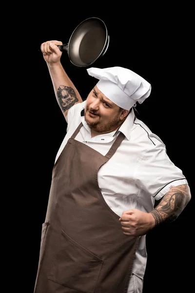 Молодий шеф-кухар зі сковородою — стокове фото