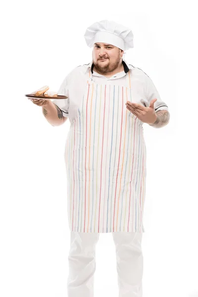 Chef with doughnuts on plate — Stock Photo, Image