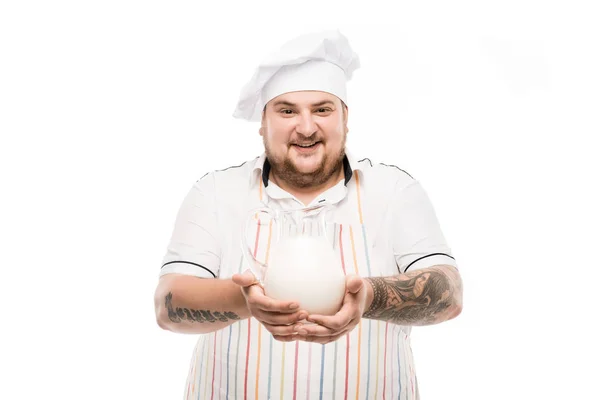 Chef-kok bedrijf pot van melk — Stockfoto