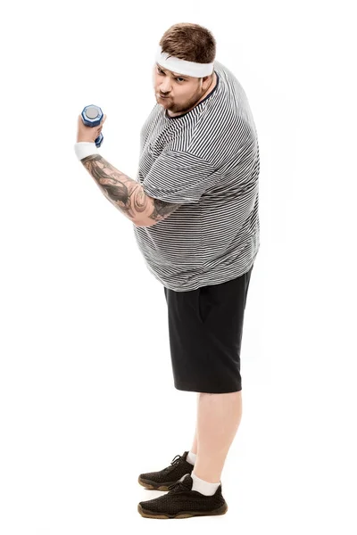 Hombre gordo flexionando bíceps con mancuerna — Foto de Stock