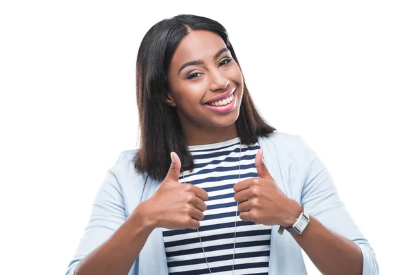 Young woman gesturing thumbs up — Stock Photo, Image