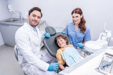 little boy and dentists clipart