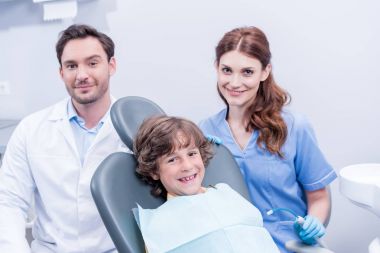 little boy and dentists clipart