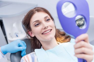 Woman in dental clinic clipart