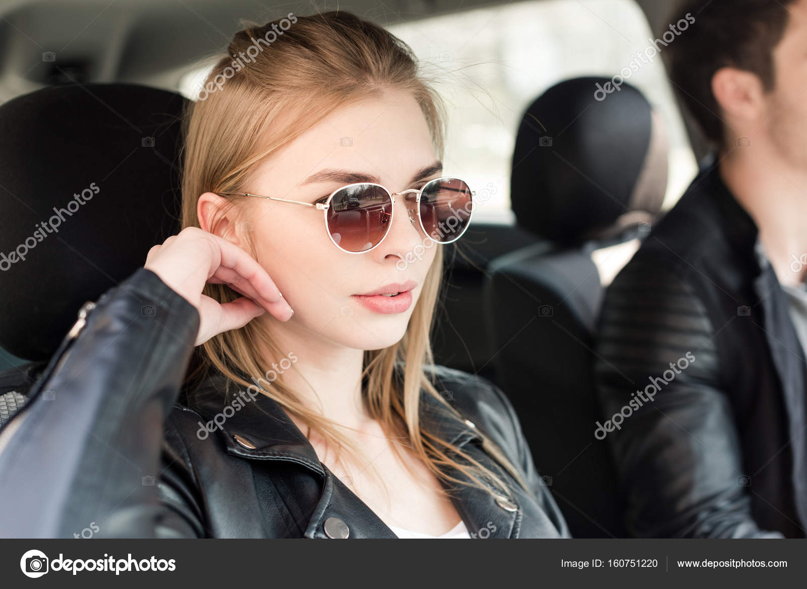 Stylish woman in sunglasses in car — Stock Photo © DmitryPoch 160751220