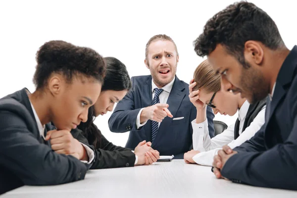 Бизнесмен ссорящийся с коллегами — стоковое фото
