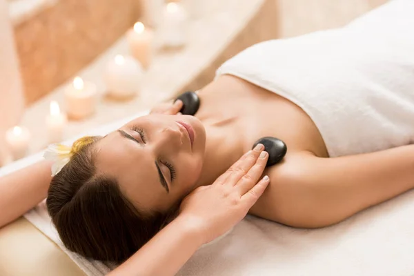 Woman having stone massage — Stock Photo, Image