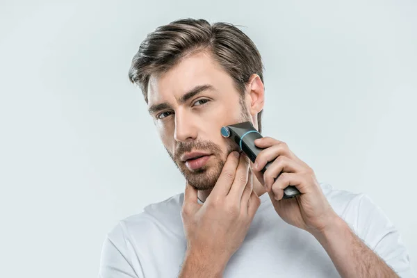 Man using electric razor — Stock Photo, Image