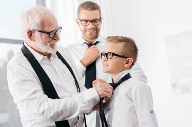 grandfather helping grandson with tie clipart