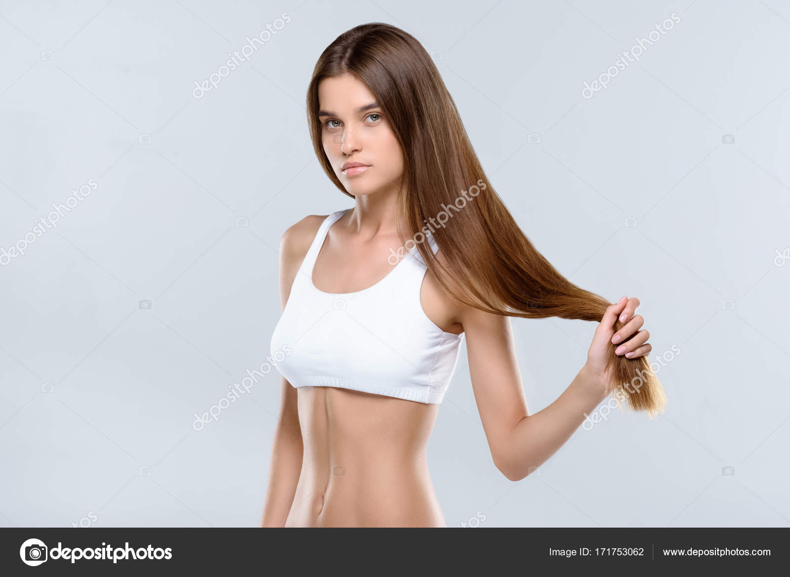 Attractive young slim woman Stock Photo by ©DmitryPoch 171753062