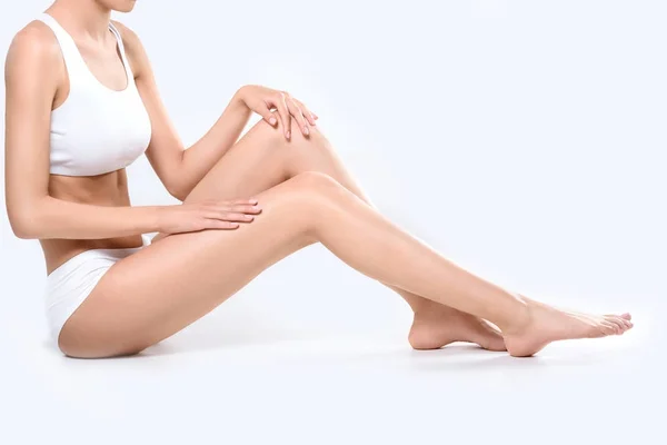 Woman Applying Cream To Legs — Stock Image Woman Applying Cream To Legs Stock Image