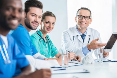 team of doctors having conversation clipart