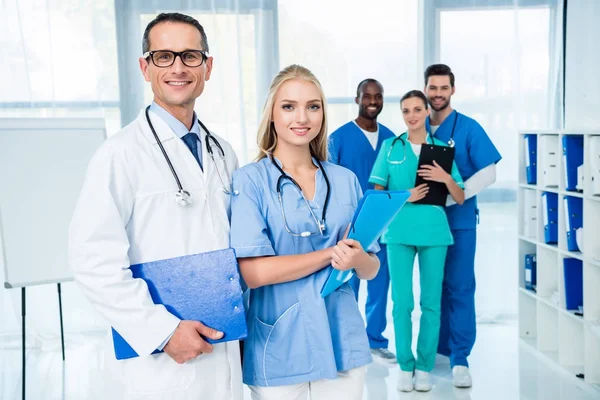 Multiethnic doctors in clinic — Stock Photo, Image