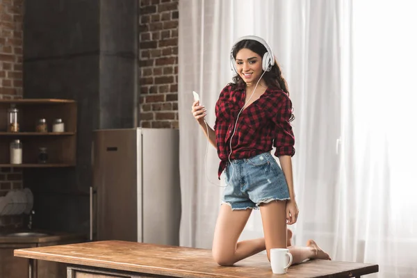 Girl Checkered Shirt Smiling Camera While Listening Music Headphones Using — Stock Photo, Image