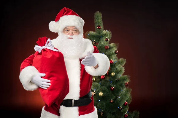 Père Noël avec sac rouge — Photo de stock