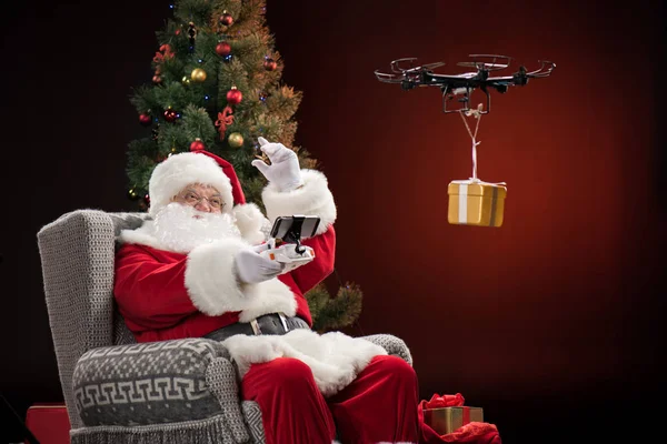 Santa Claus using drone — Stock Photo