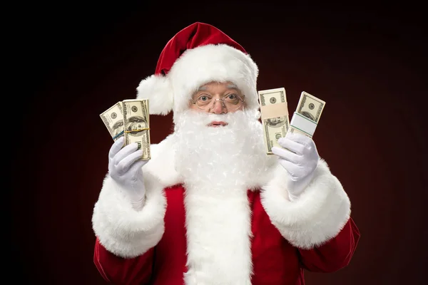 Санта-Клаус с долларами — стоковое фото