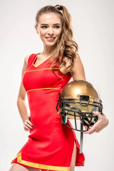 Cheerleader posa con casco — Foto stock