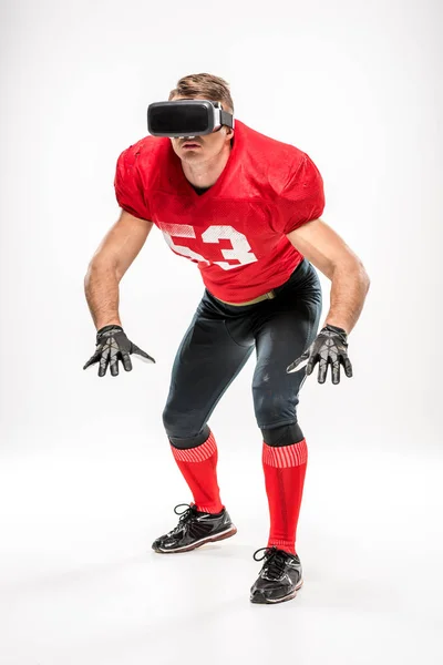Football player in virtual reality headset — Stock Photo