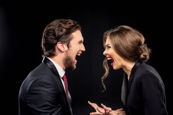 Laughing couple in formal wear — Stock Photo